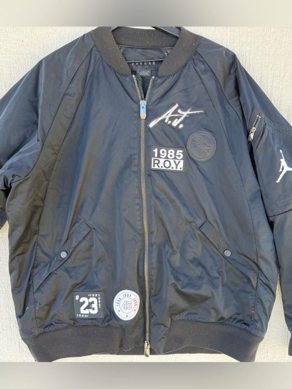 Jordan Black Bomber Jacket with White Accents has some marks, fuse in collar